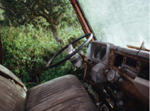 The interior of a wrecked car.